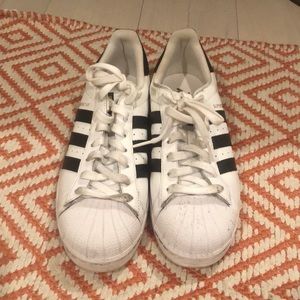 Adidas black and white superstar sneakers